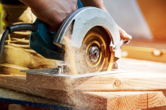 Floor repairs geelong cutting a peice of timber down to suit the floor Floor repairs geelong cutting a peice of timber down to suit the floor